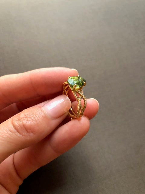 Ring "3 Snakes" Yellow Gold with White Diamonds and a Green Tourmaline 2.71ct.