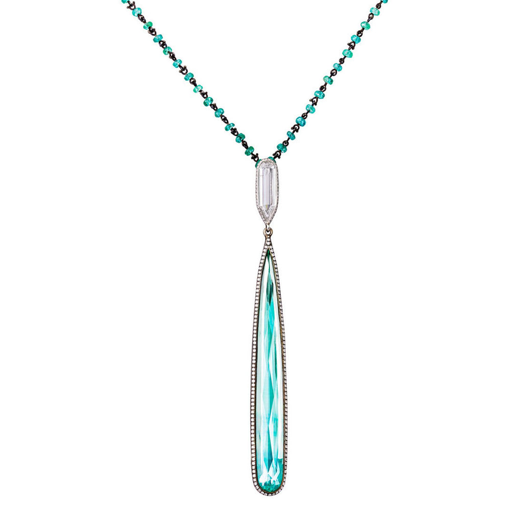 Pendant Platinum with an unique Beryll-Emerald needle and White Diamonds